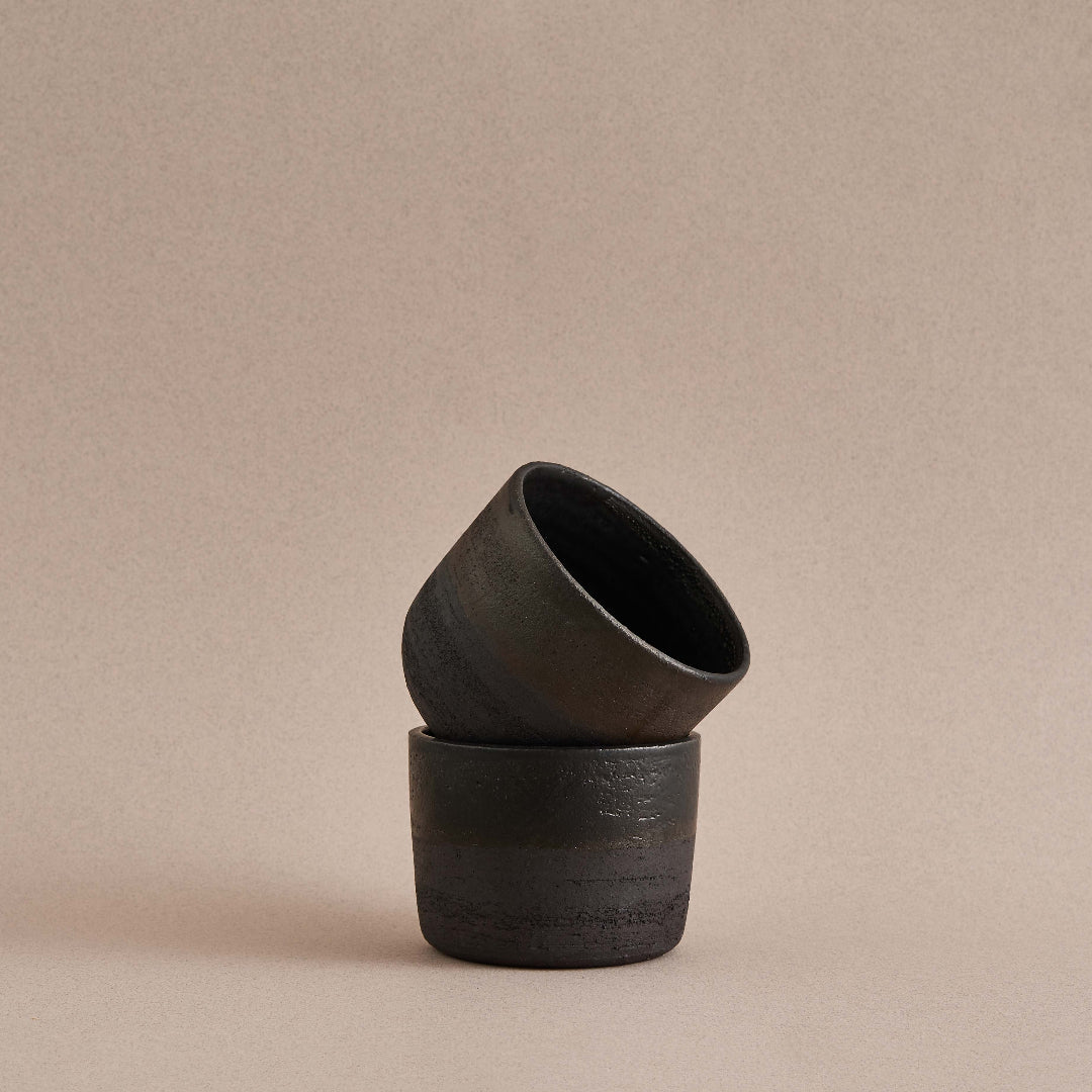 black stoneware handleless mug